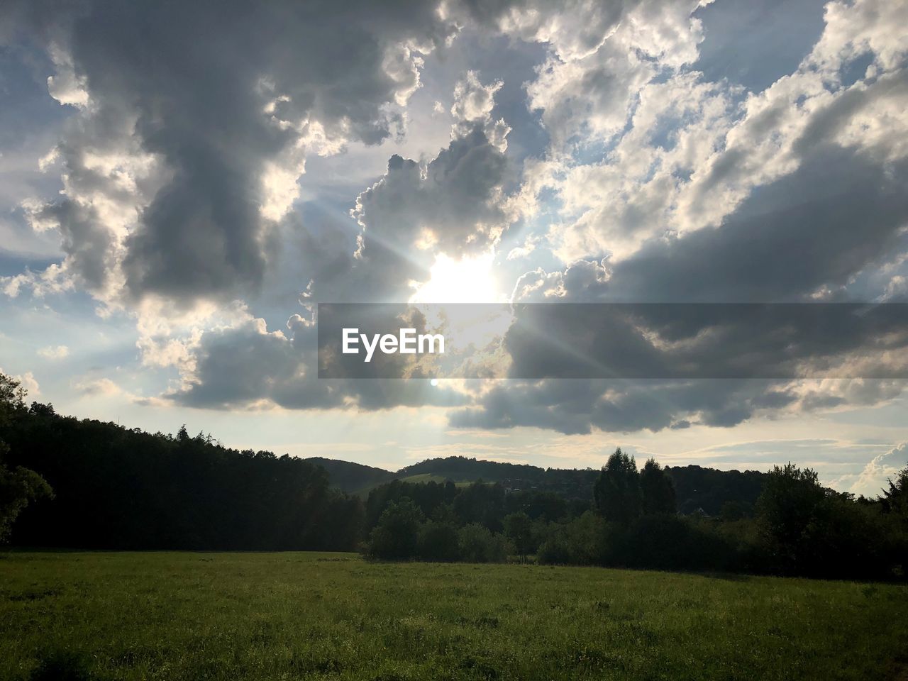 SCENIC VIEW OF FIELD AGAINST SKY DURING SUNSET