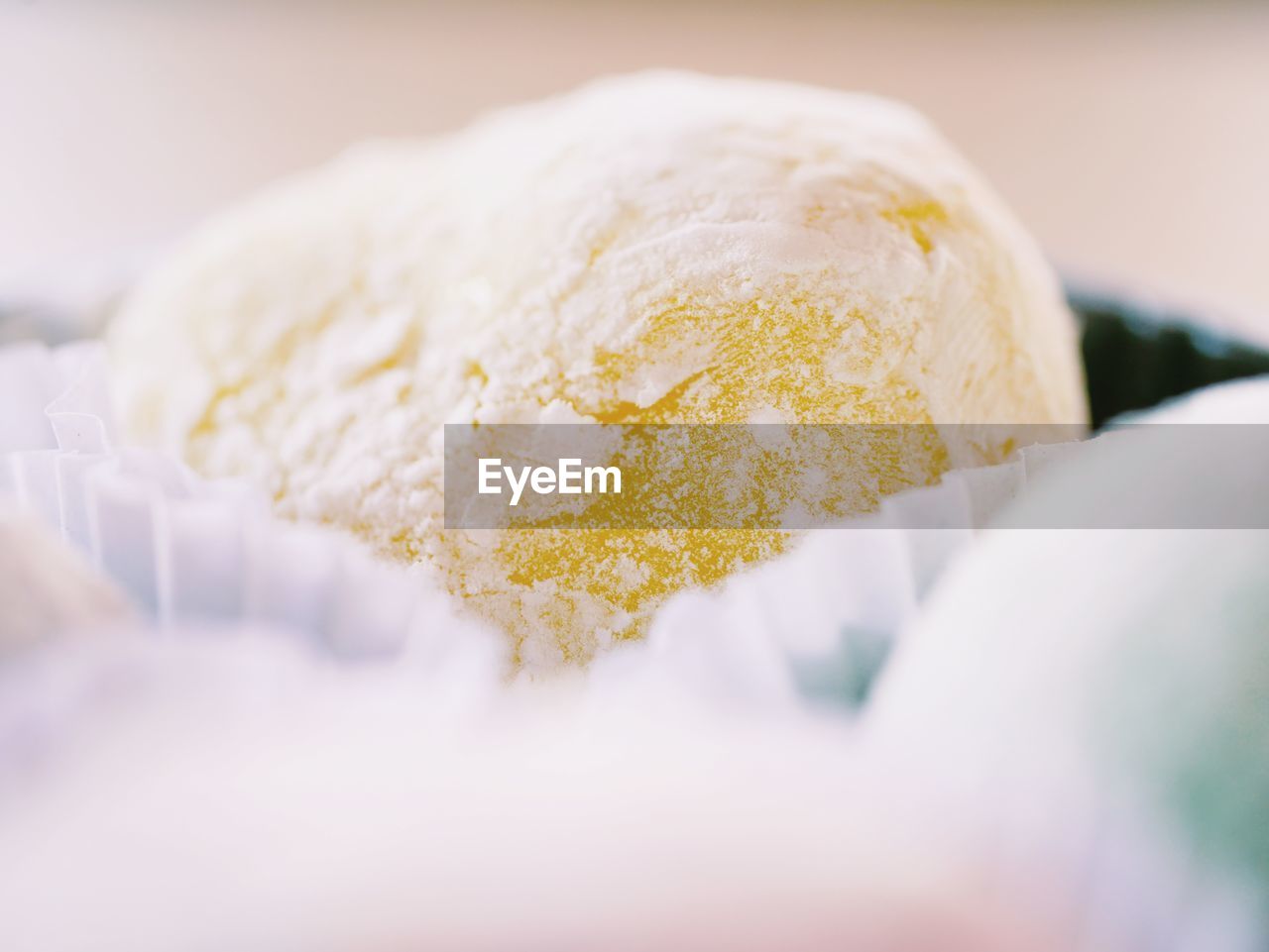 CLOSE-UP OF CAKE ON WHITE