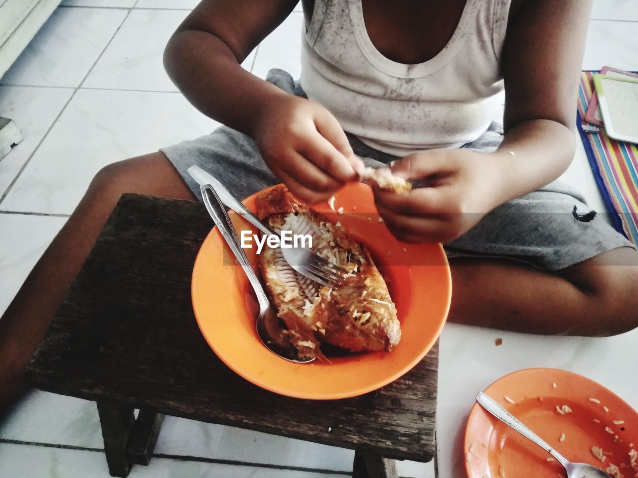 Midsection of woman holding food