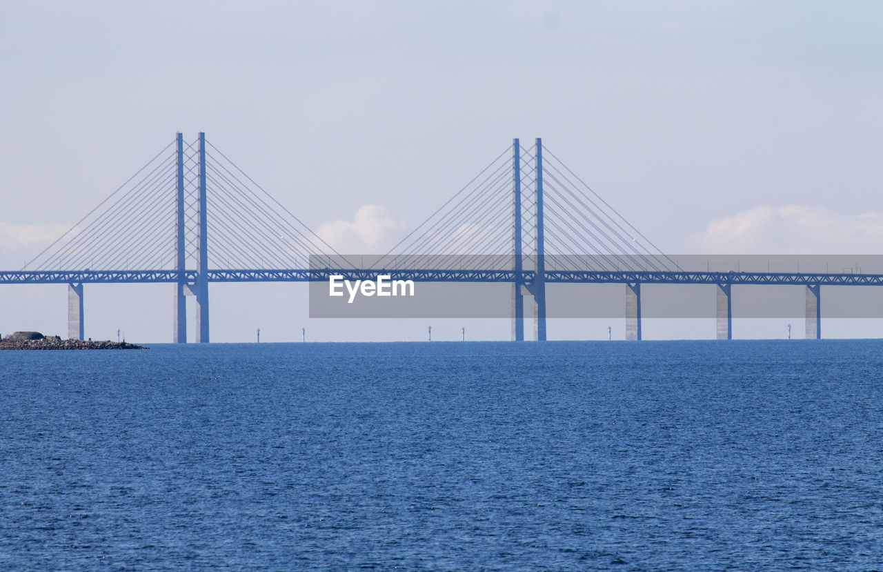 View of suspension bridge over sea