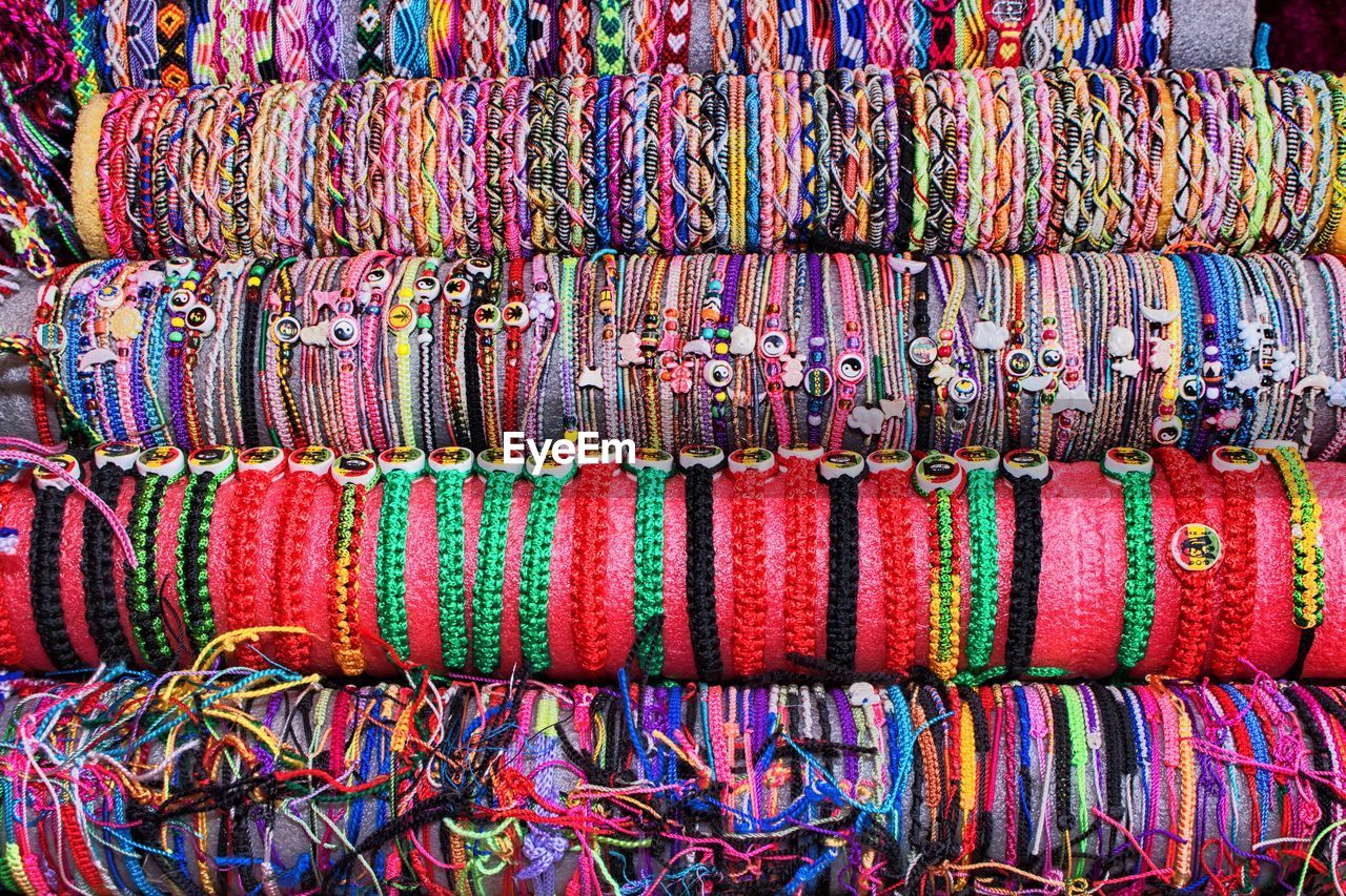 Full frame shot of multi colored bracelets for sale at market