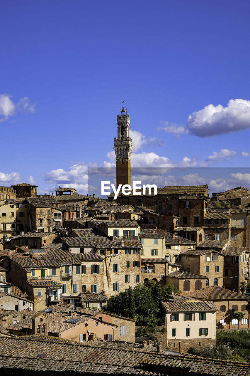 Panoramic view of siena with tiled rooftops, duomo and torre del mangia - tuscany, italy