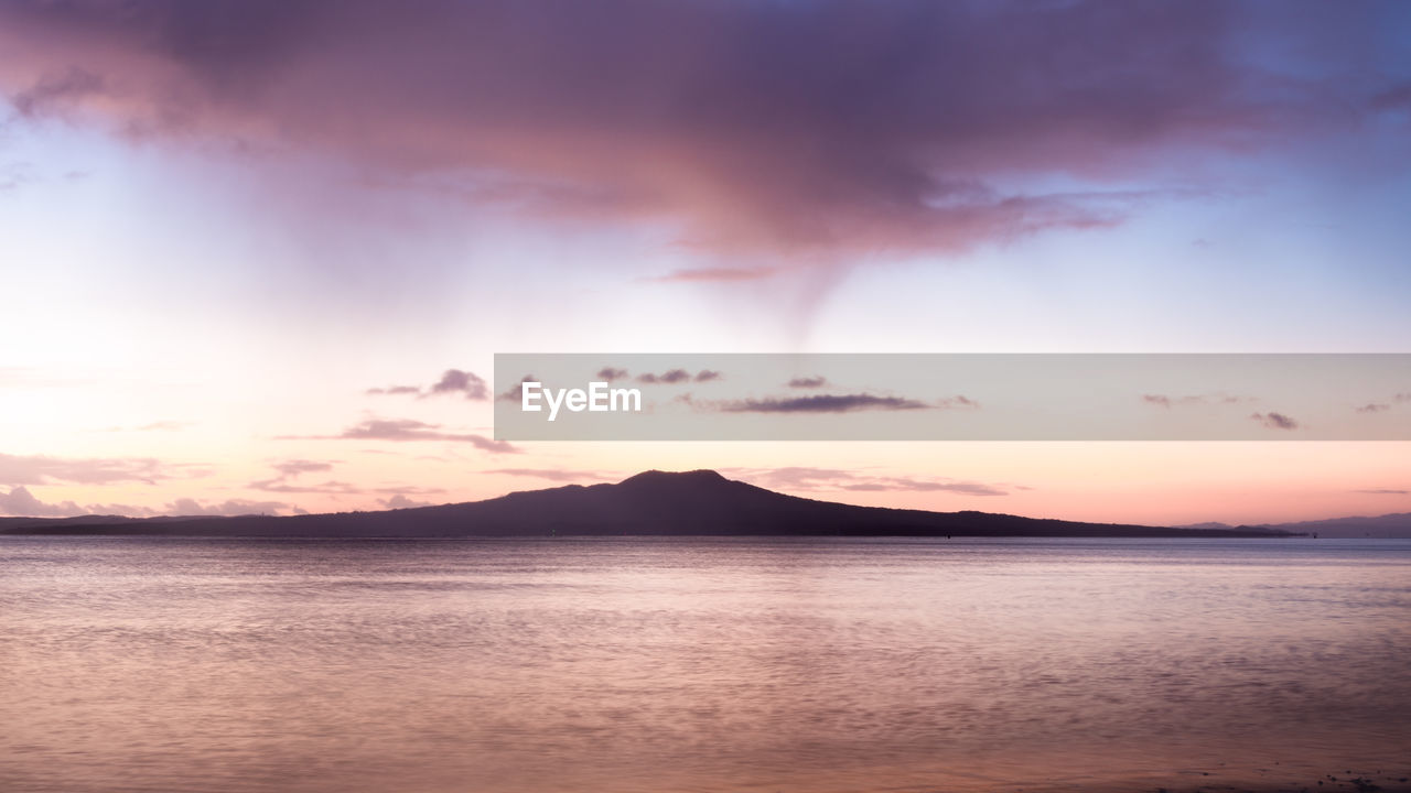 SCENIC VIEW OF SEA DURING SUNSET