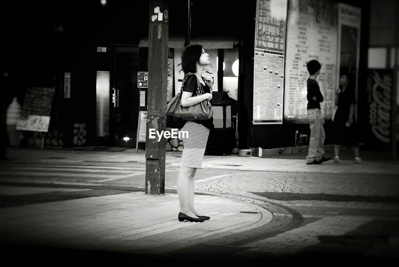 LOW ANGLE VIEW OF WOMAN