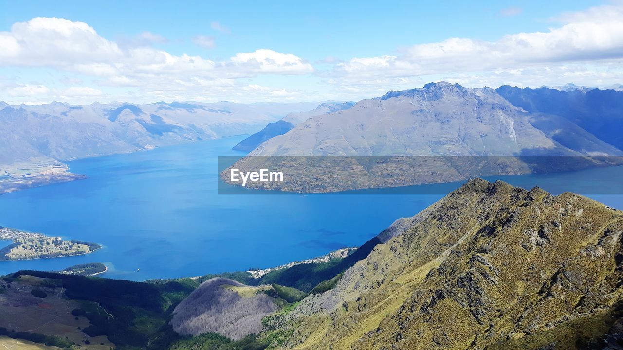 Panoramic view of lake and mountains against sky