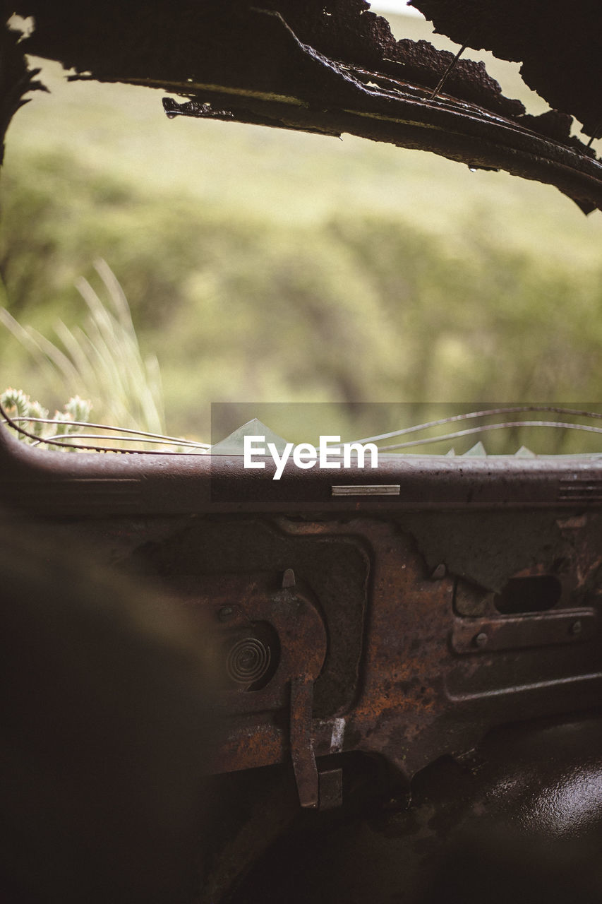 Close-up of abandoned car