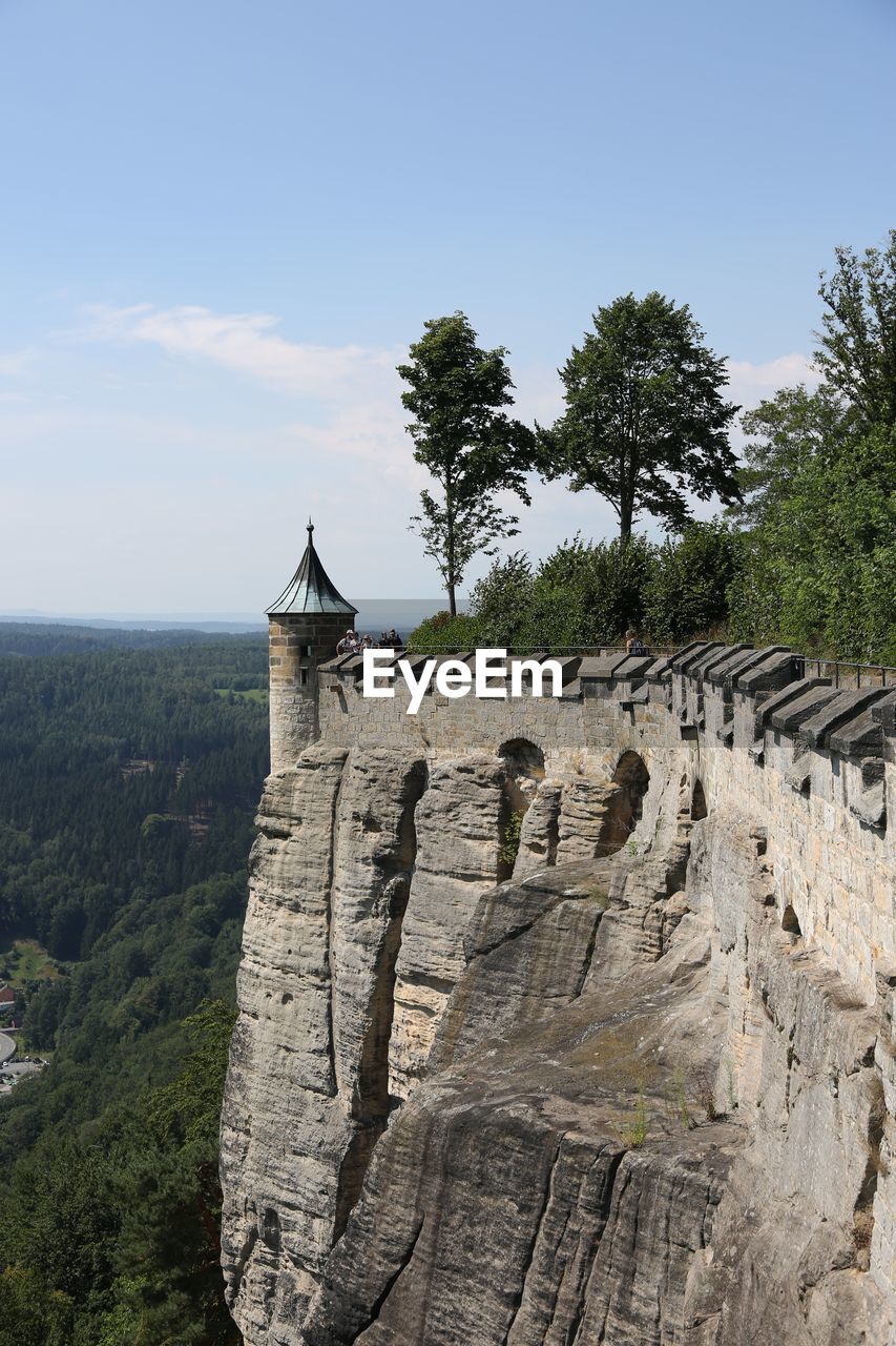 View of castle on mountain against sky