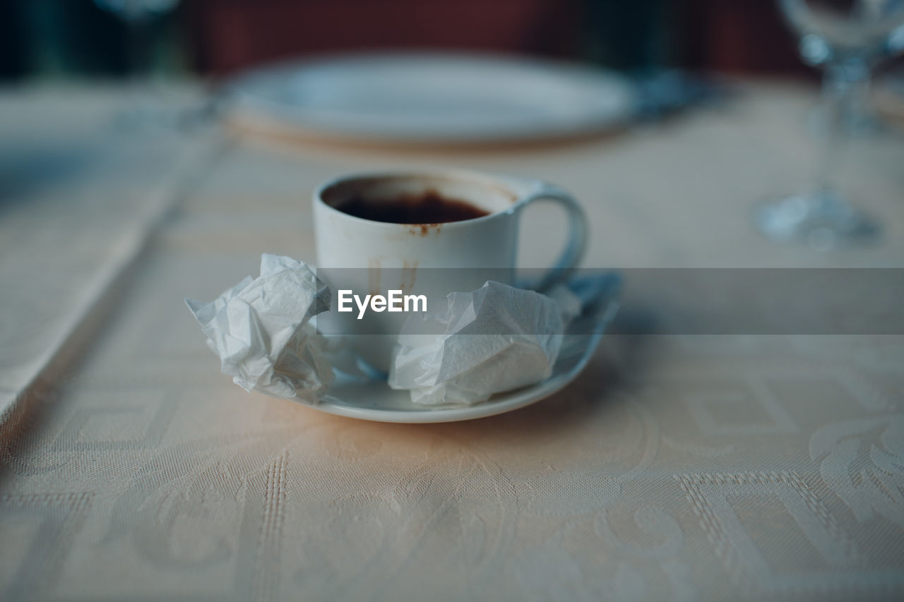 High angle view of coffee cup on table