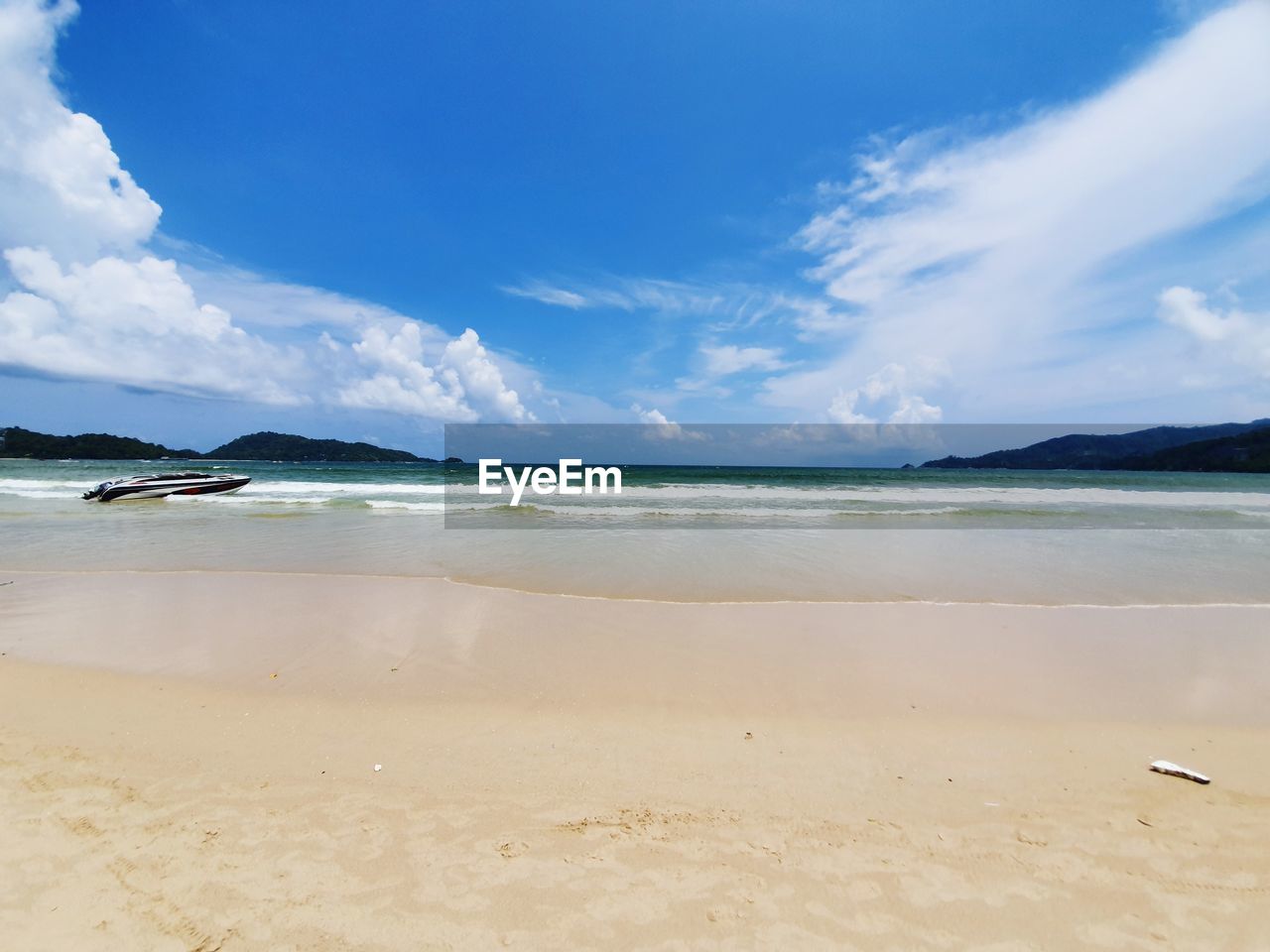 Scenic view of beach against sky