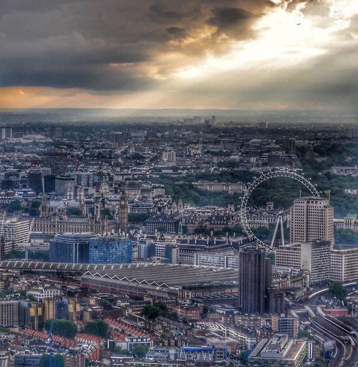 CITYSCAPE AGAINST CLOUDY SKY