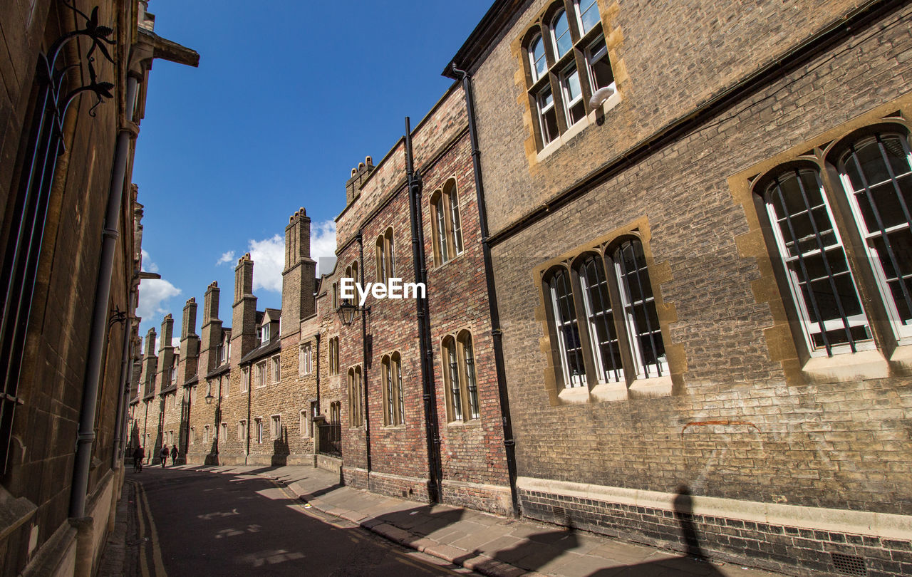 Buildings in city against sky