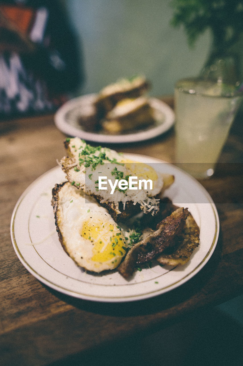 CLOSE-UP OF BREAKFAST ON TABLE