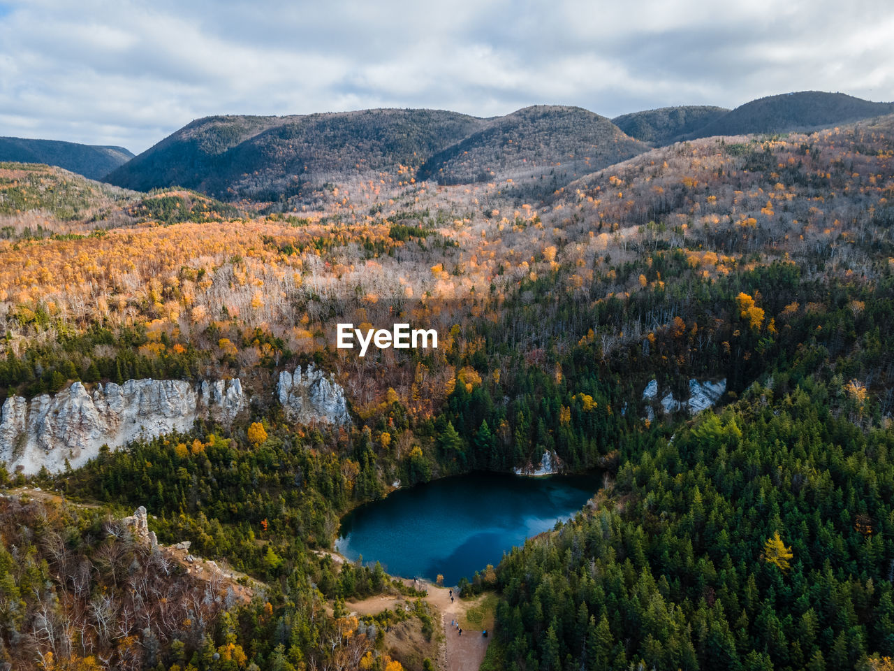 High angle view of landscape and mountains against sky