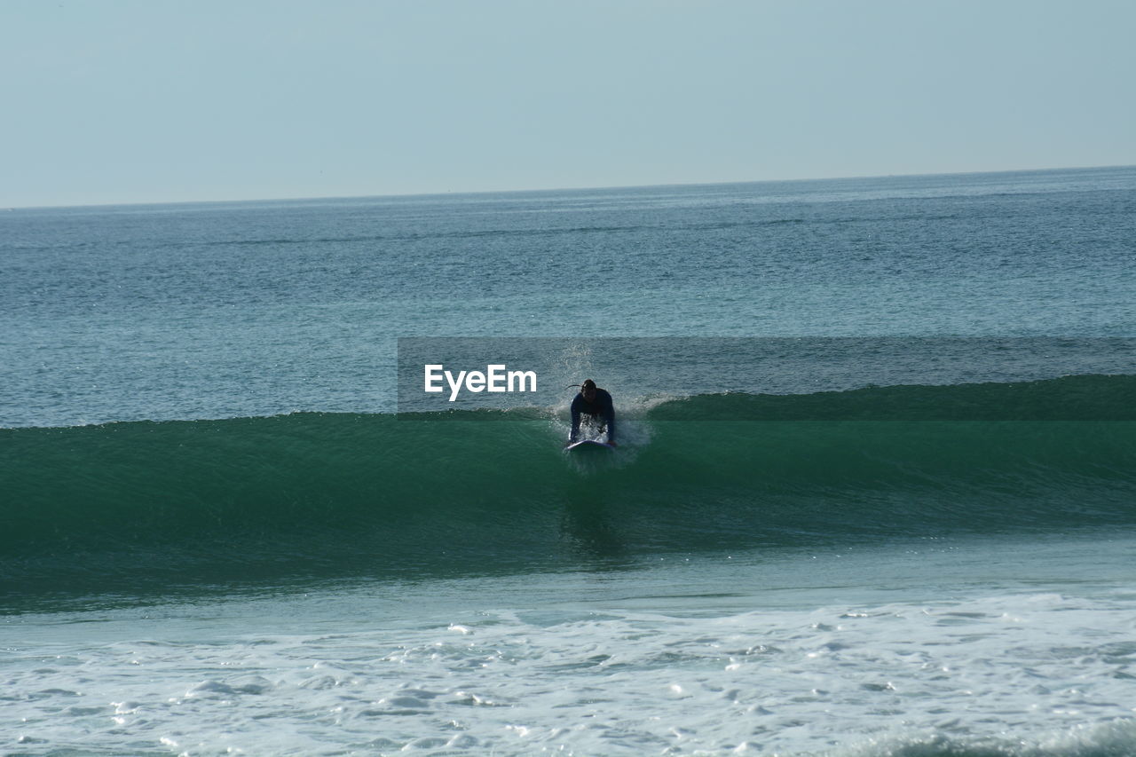 Man surfing in sea