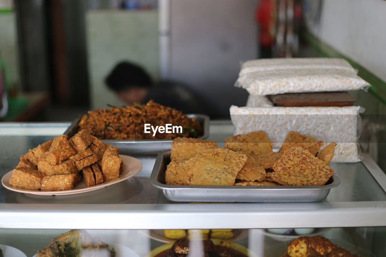 Close-up of food in plates on table