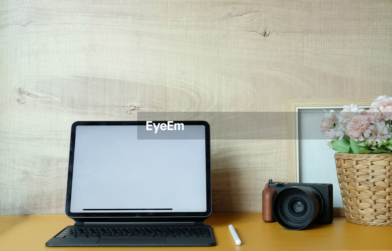 Low angle view of laptop on table at home