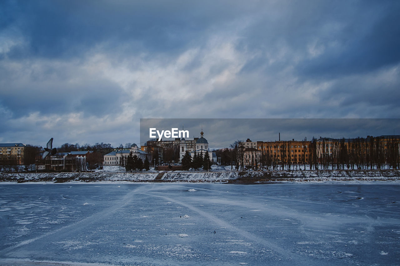 Winter stormy sky and gloomy clouds. defocused image for design.