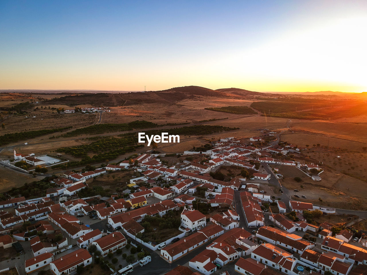 Aerial view of a landscape with village in alentejo at the sunset. portugal. drone photo