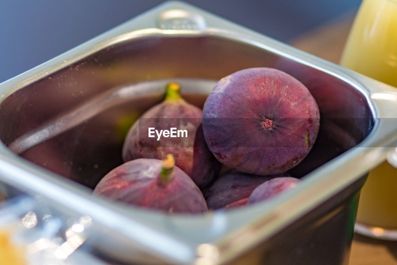 Close-up of fruits in container