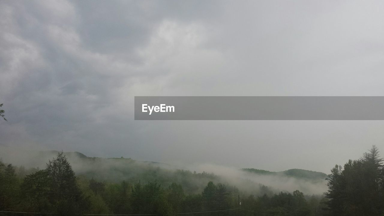 View of fog over mountain