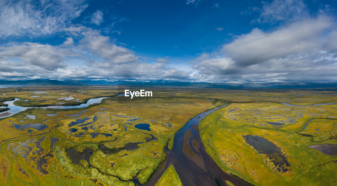 PANORAMIC SHOT OF LAND AGAINST SKY