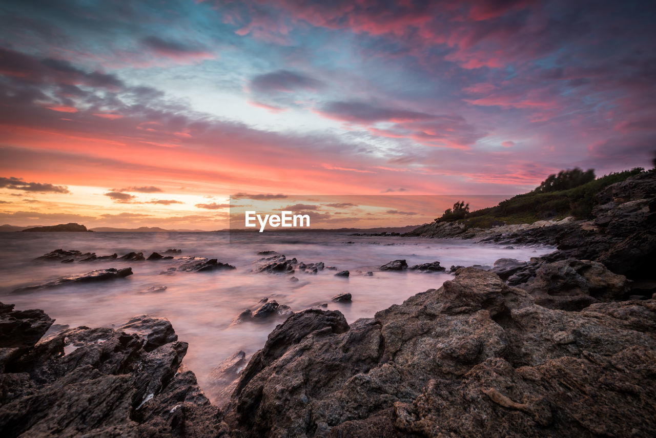 SCENIC VIEW OF SEA DURING SUNSET