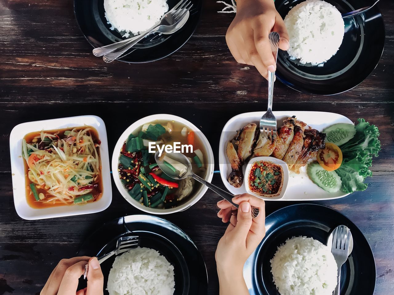 Directly above shot of person preparing food on table