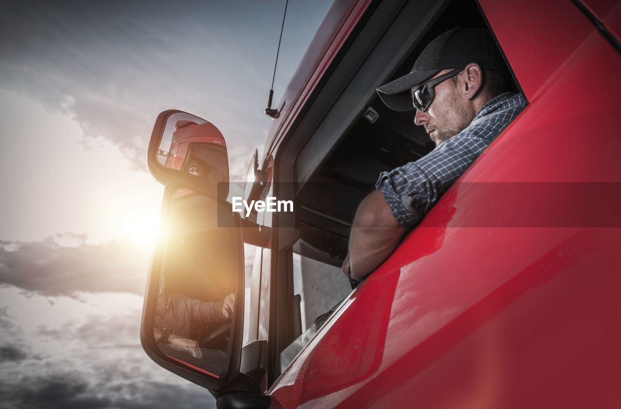 Low angle view of man in truck