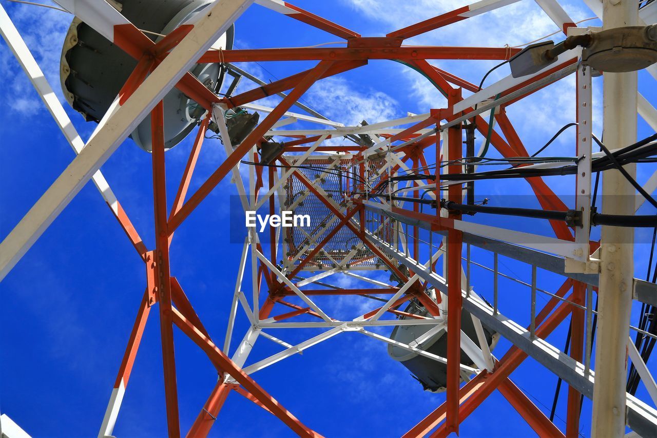 Directly below shot of communications tower against sky