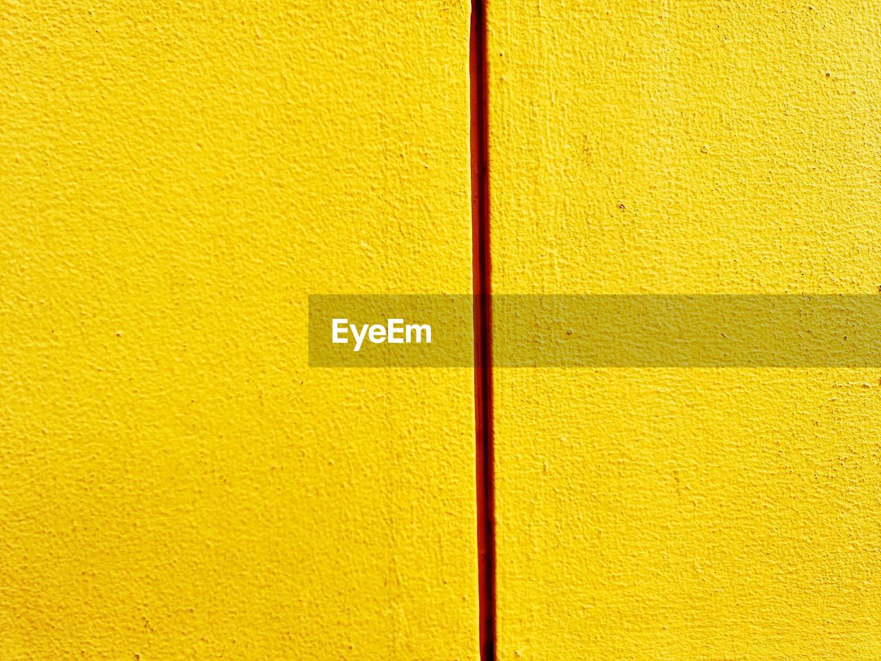 yellow, full frame, backgrounds, textured, no people, line, wall - building feature, pattern, built structure, orange, close-up, architecture, circle, day, outdoors