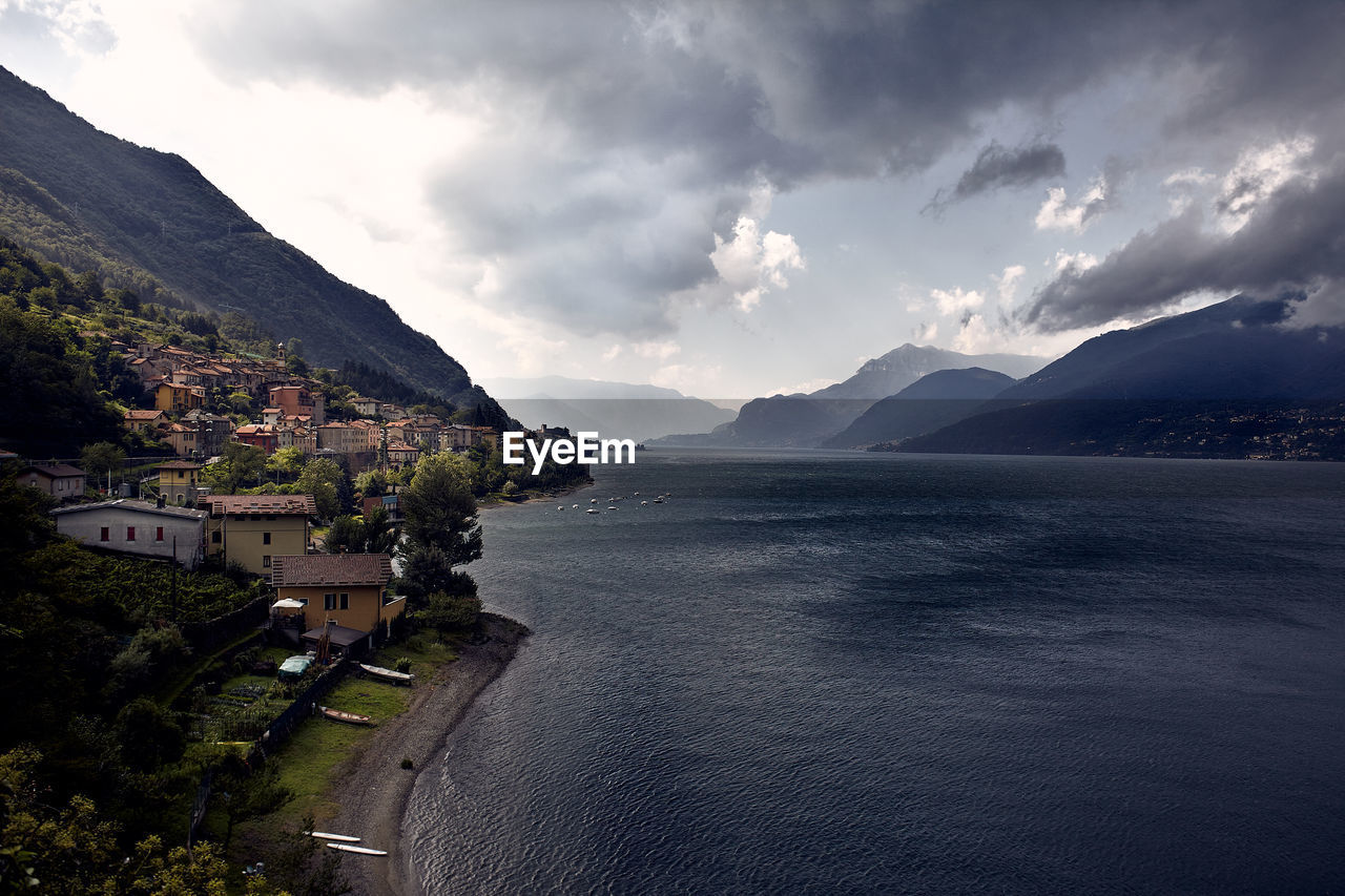 Scenic view of lake como and mountains against sky