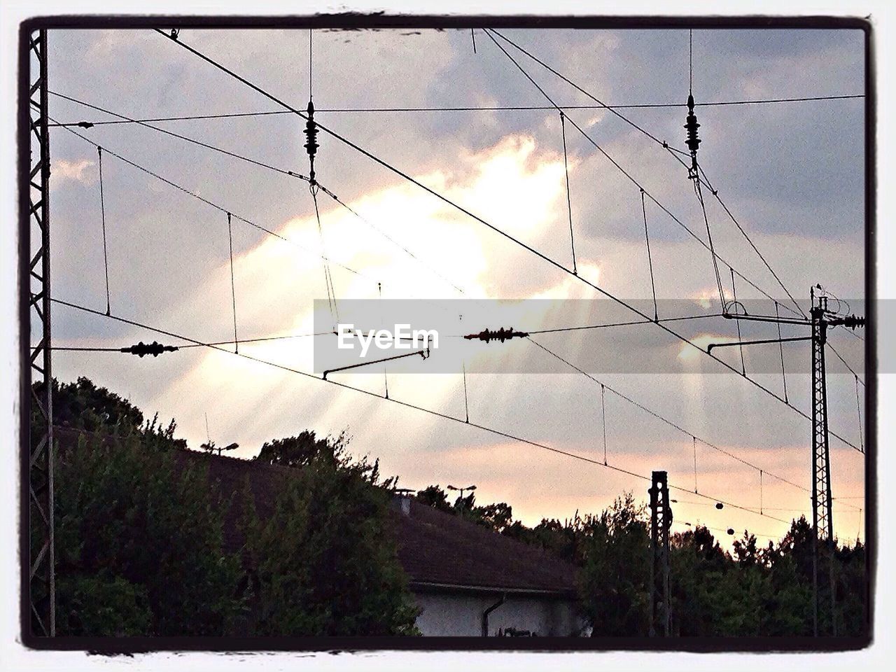 LOW ANGLE VIEW OF ELECTRICITY PYLON AGAINST SKY