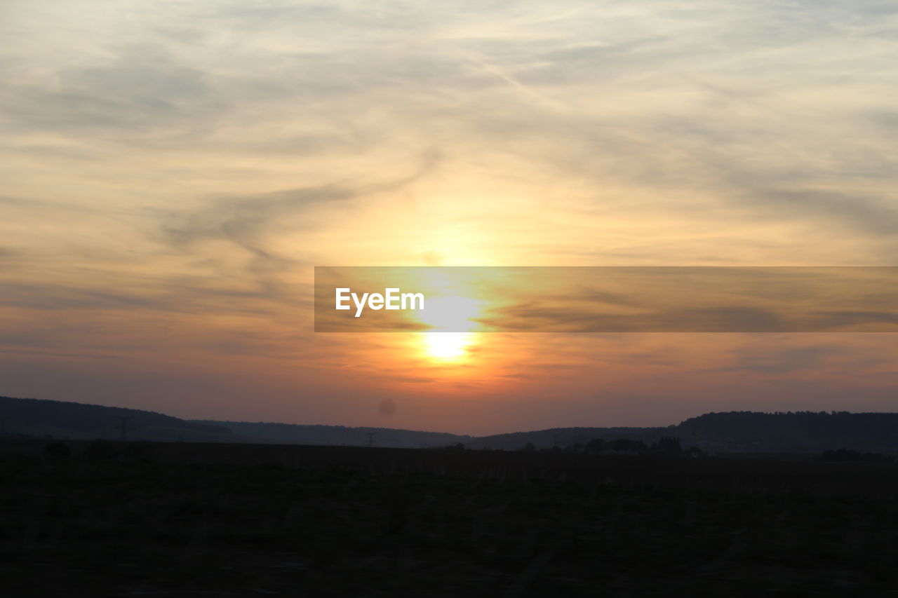 SILHOUETTE LANDSCAPE AGAINST SKY DURING SUNSET