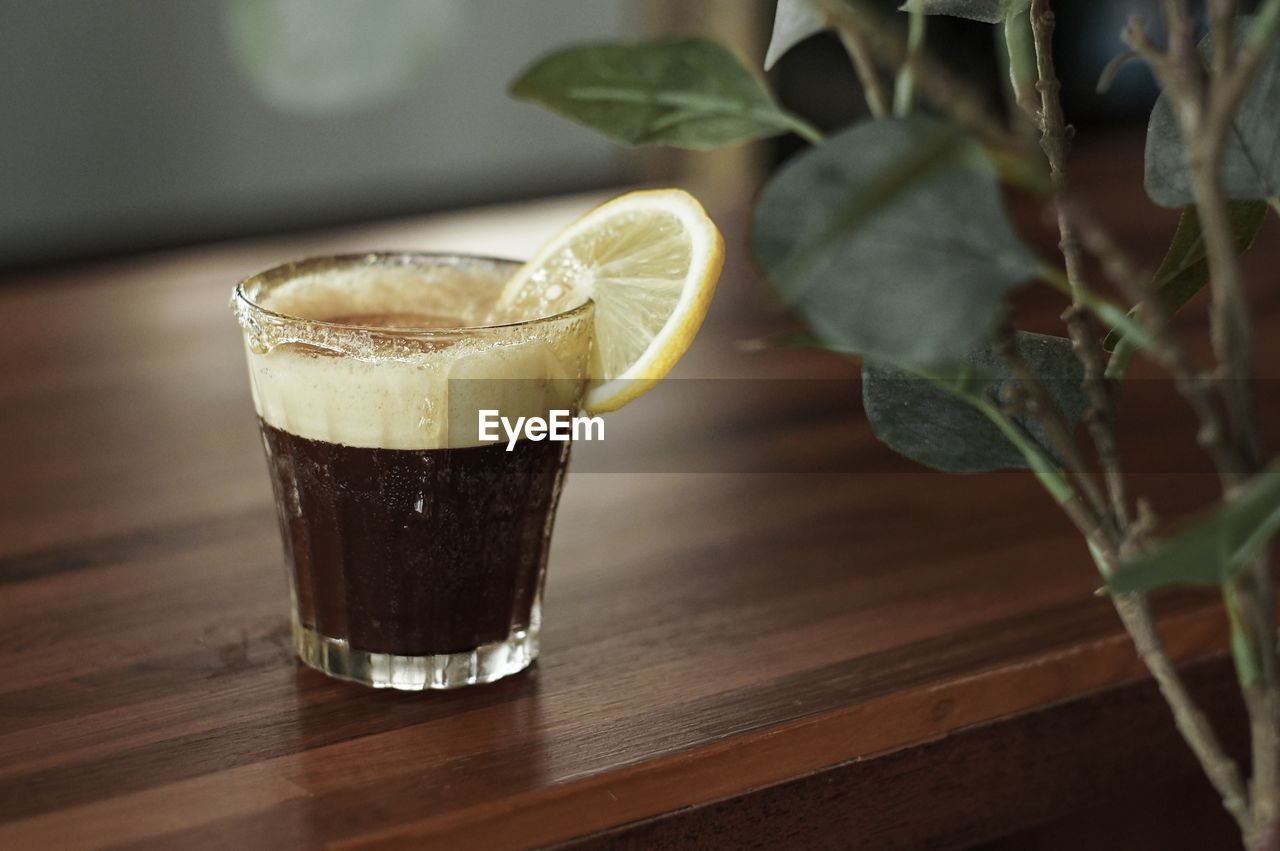 Close-up of drink served on table