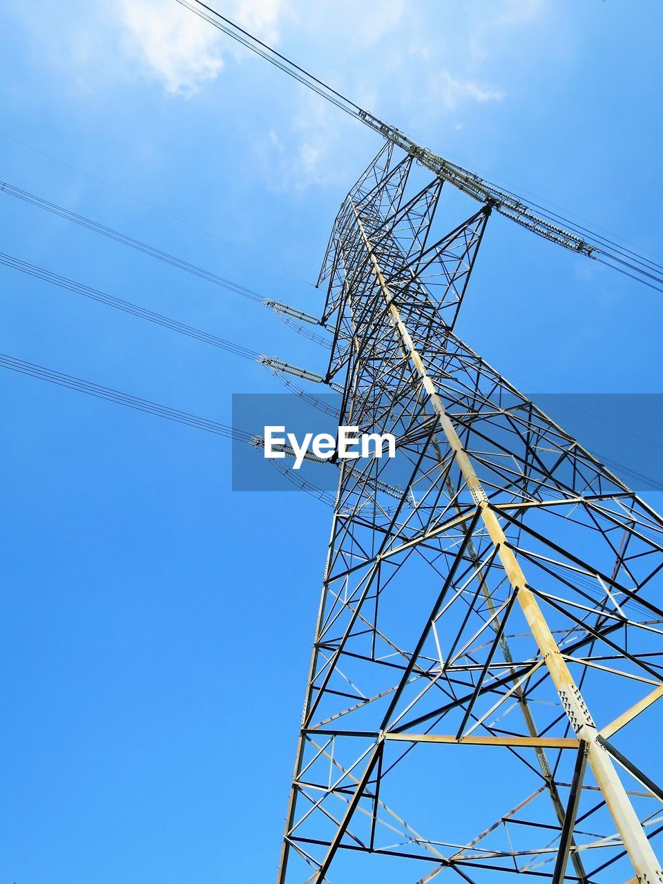LOW ANGLE VIEW OF ELECTRICITY PYLONS AGAINST SKY