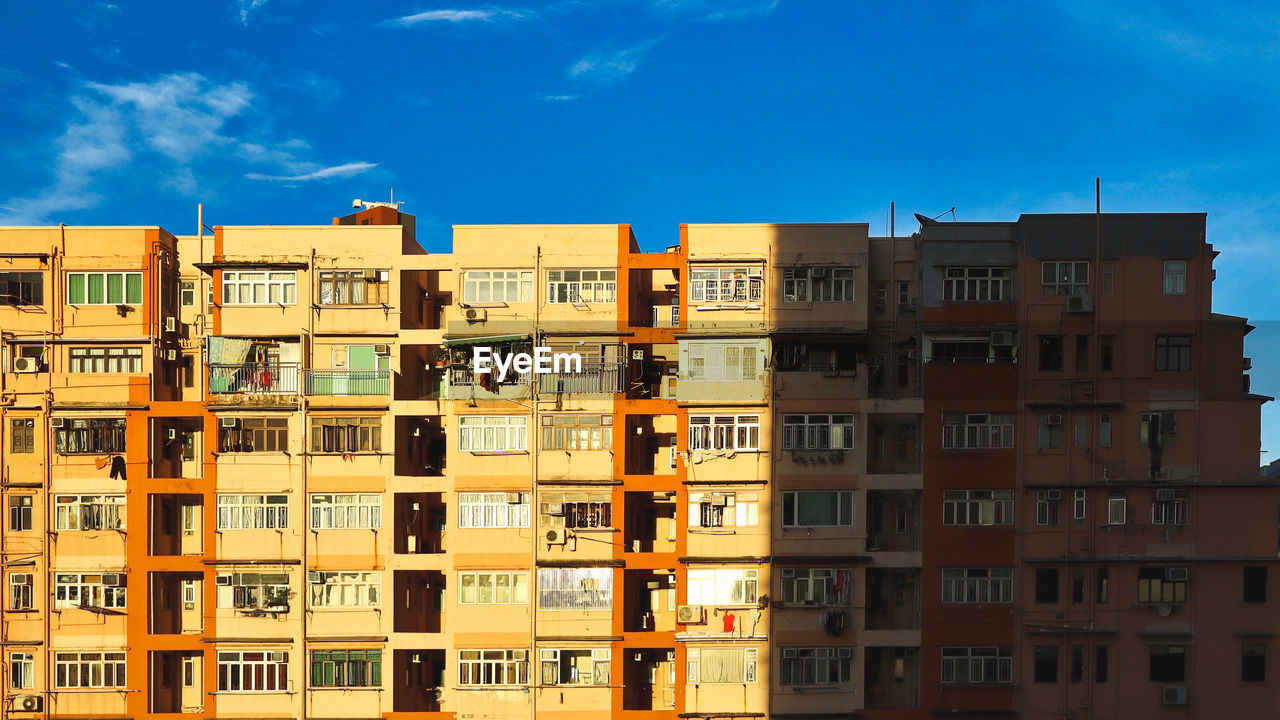 Low angle view of residential buildings against sky