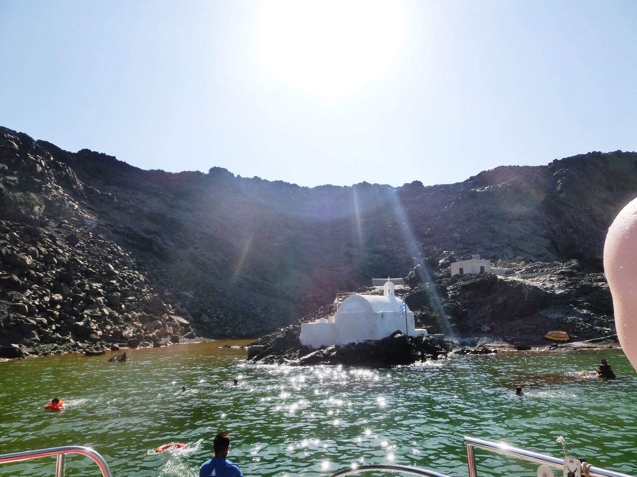 SCENIC VIEW OF WATER FLOWING THROUGH MOUNTAINS