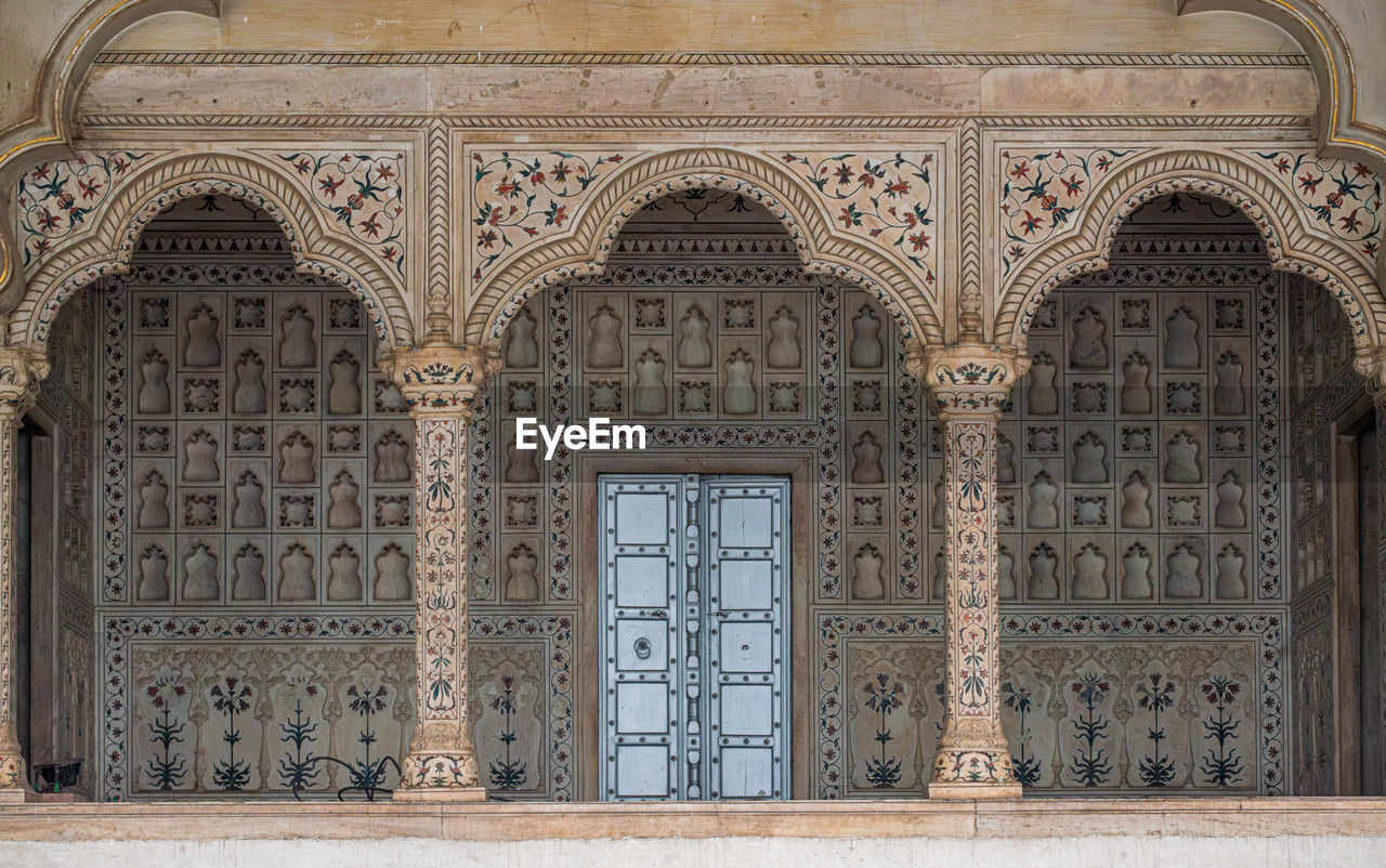 architecture, built structure, arch, history, the past, pattern, place of worship, no people, religion, ornate, travel destinations, building exterior, craft, building, facade, palace, calligraphy, ancient history, day, entrance, door, architectural feature, ancient, iron, belief, wall - building feature, outdoors, travel, creativity, tourism, marble