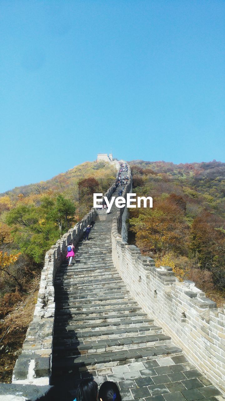 SCENIC VIEW OF MOUNTAIN AGAINST BLUE SKY