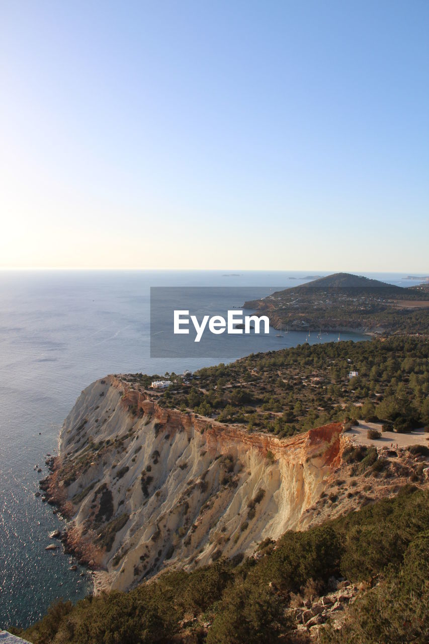 Scenic view of sea against clear sky