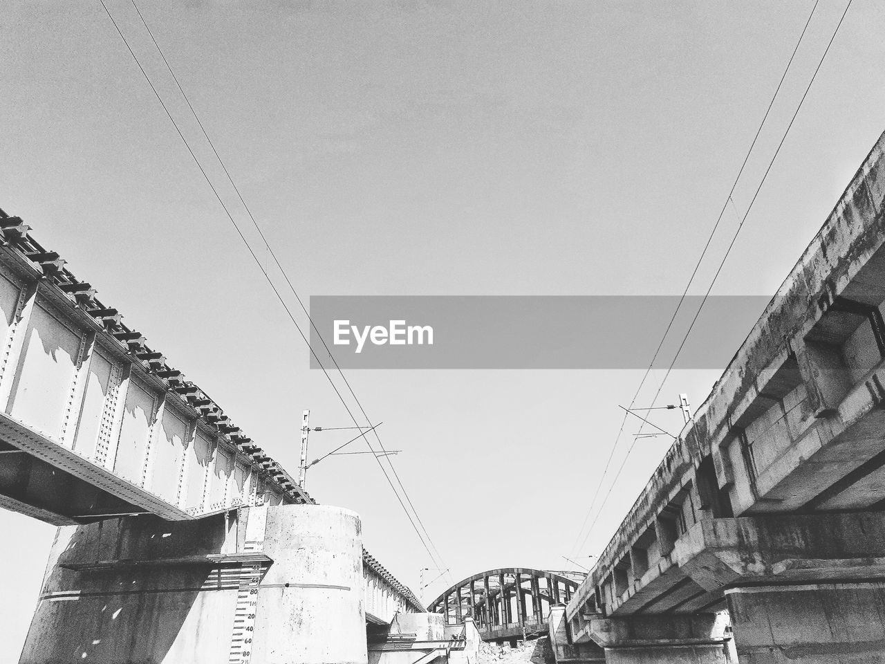 LOW ANGLE VIEW OF BRIDGE AGAINST SKY
