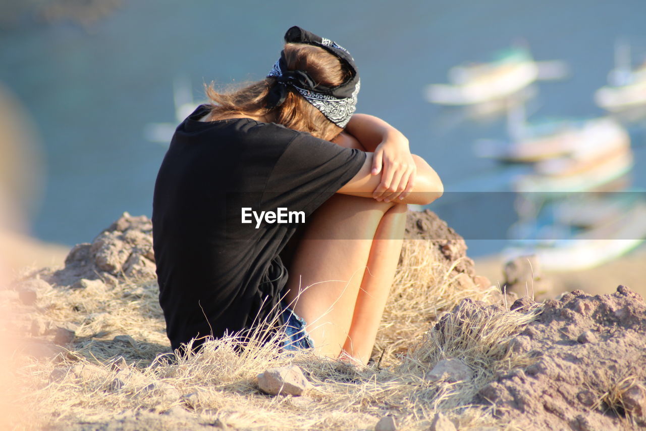 Woman sitting with yoga