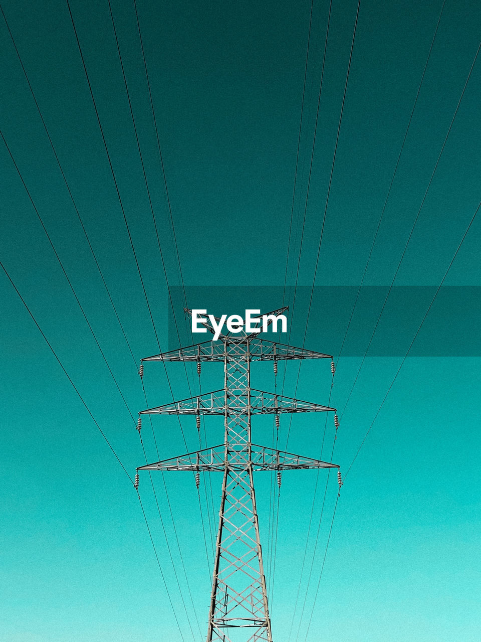 low angle view of electricity pylon against clear sky