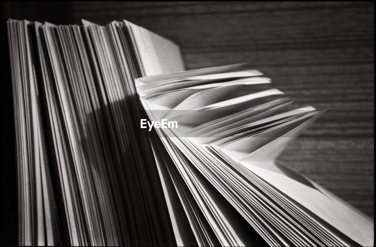 Close-up of envelops on table