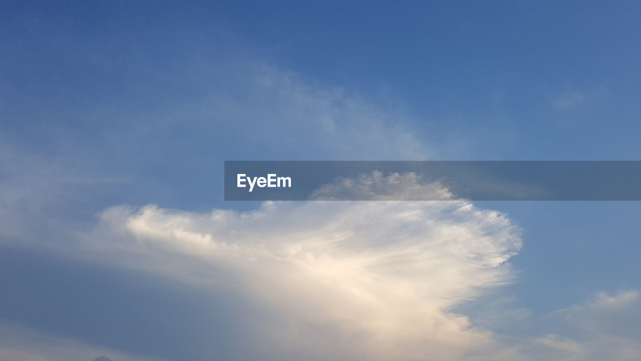 LOW ANGLE VIEW OF CLOUDS IN SKY WITH SUNLIGHT
