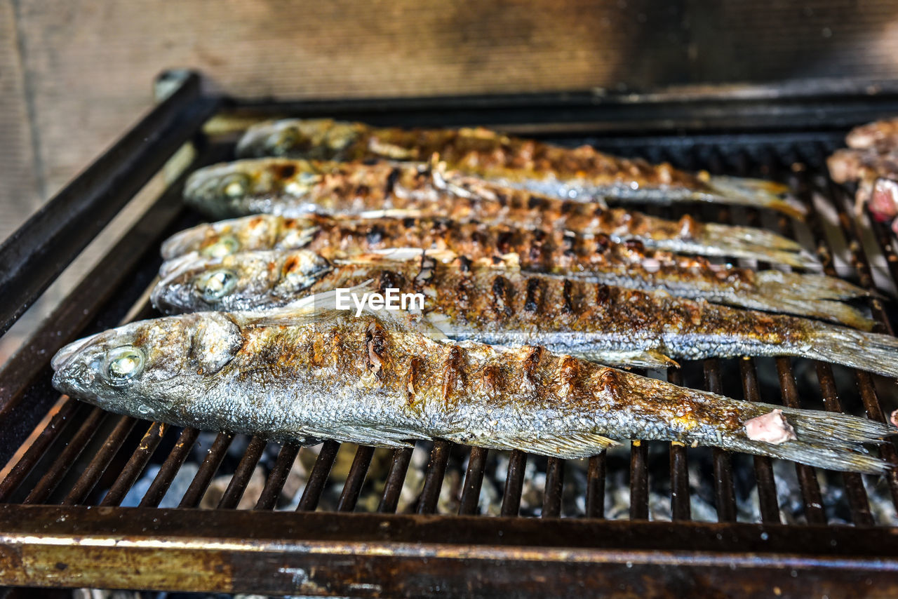 Close-up of fish on barbecue grill