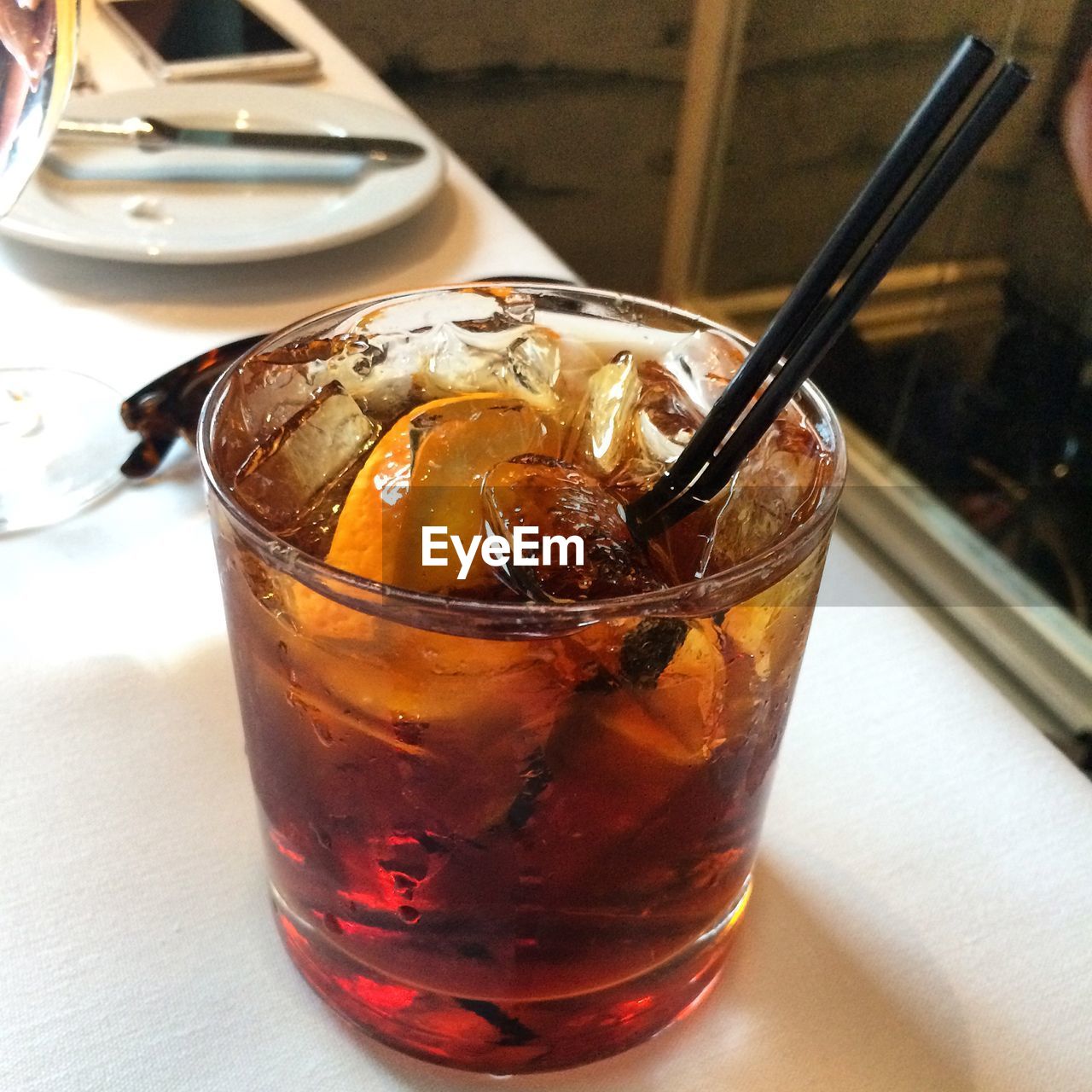 CLOSE-UP OF DRINK ON TABLE