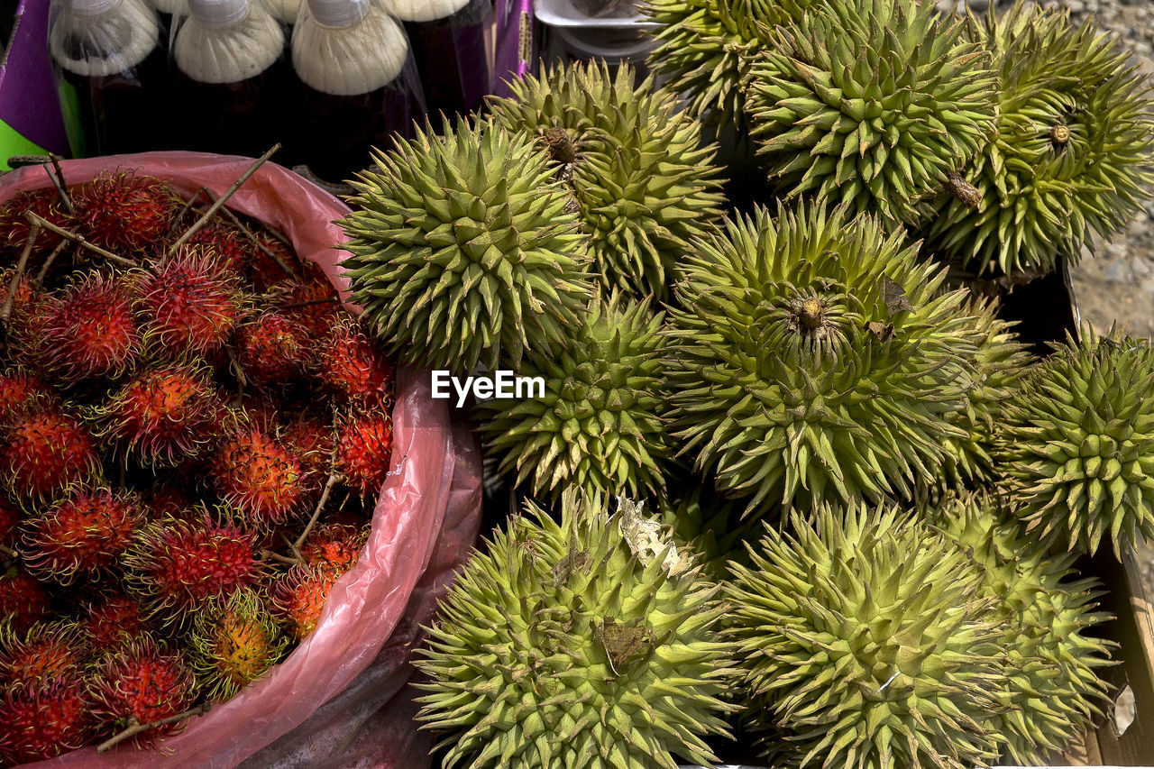 High angle view of rambutans for sale in market