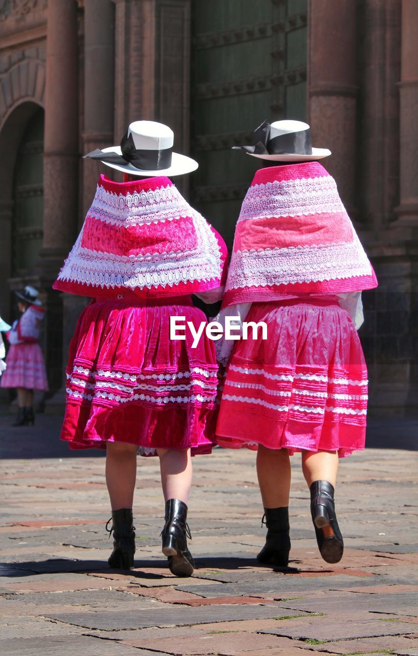 REAR VIEW OF TRADITIONAL CLOTHING