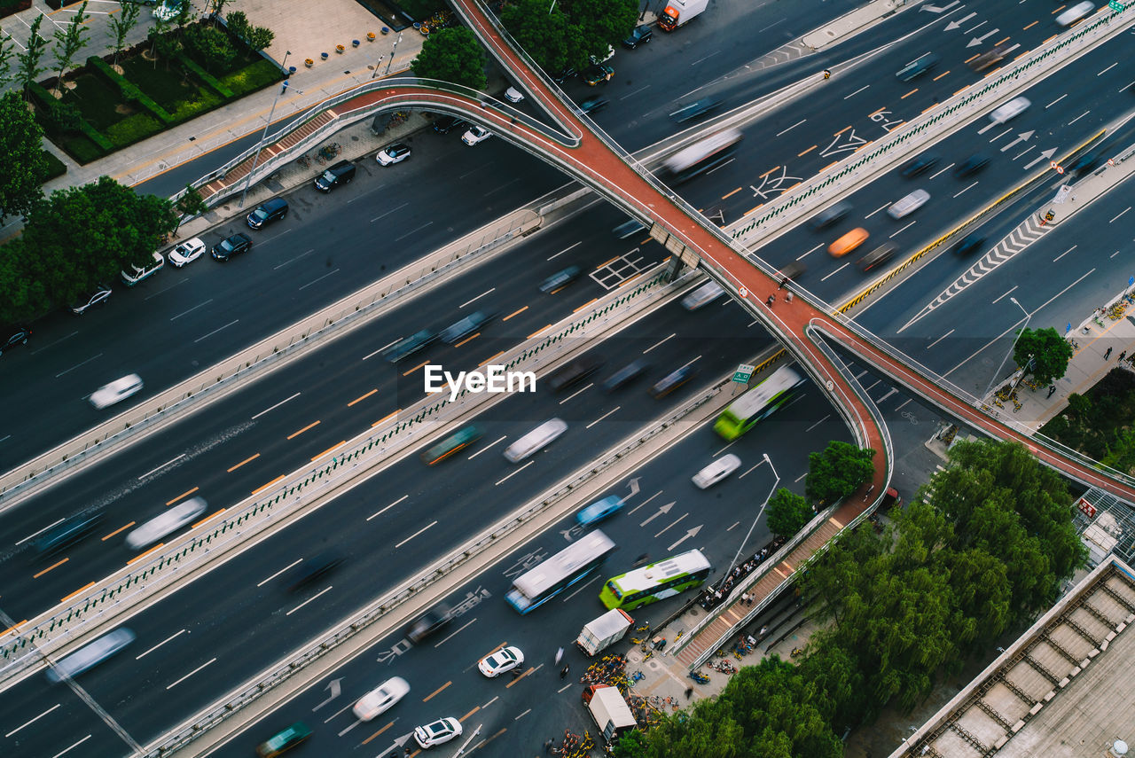 High angle view of vehicles on road in city